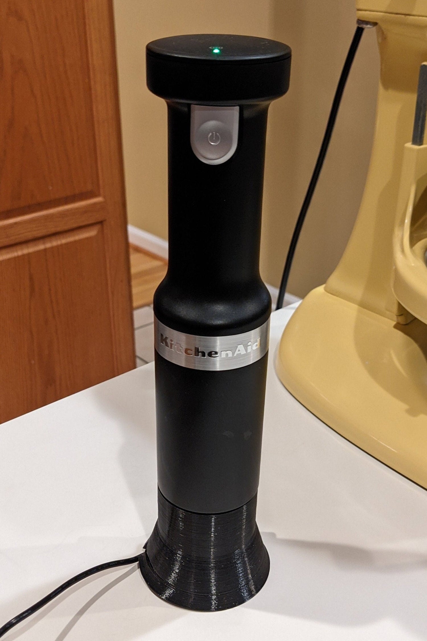 Charging stand with blender in kitchen